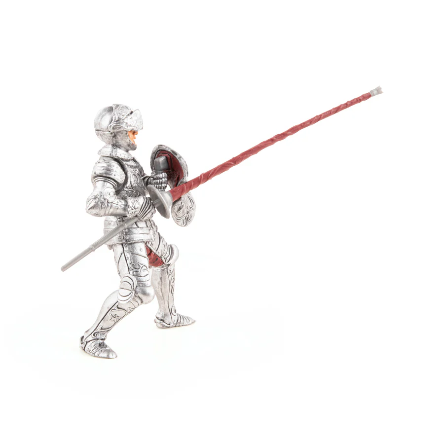 RYTÍŘ VE STŘÍBRNÉM BRNĚNÍ S DŘEVCEM