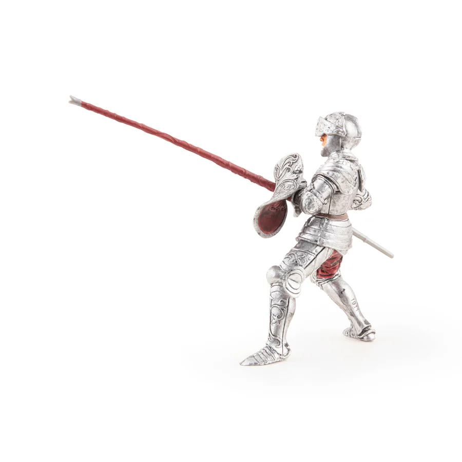 RYTÍŘ VE STŘÍBRNÉM BRNĚNÍ S DŘEVCEM