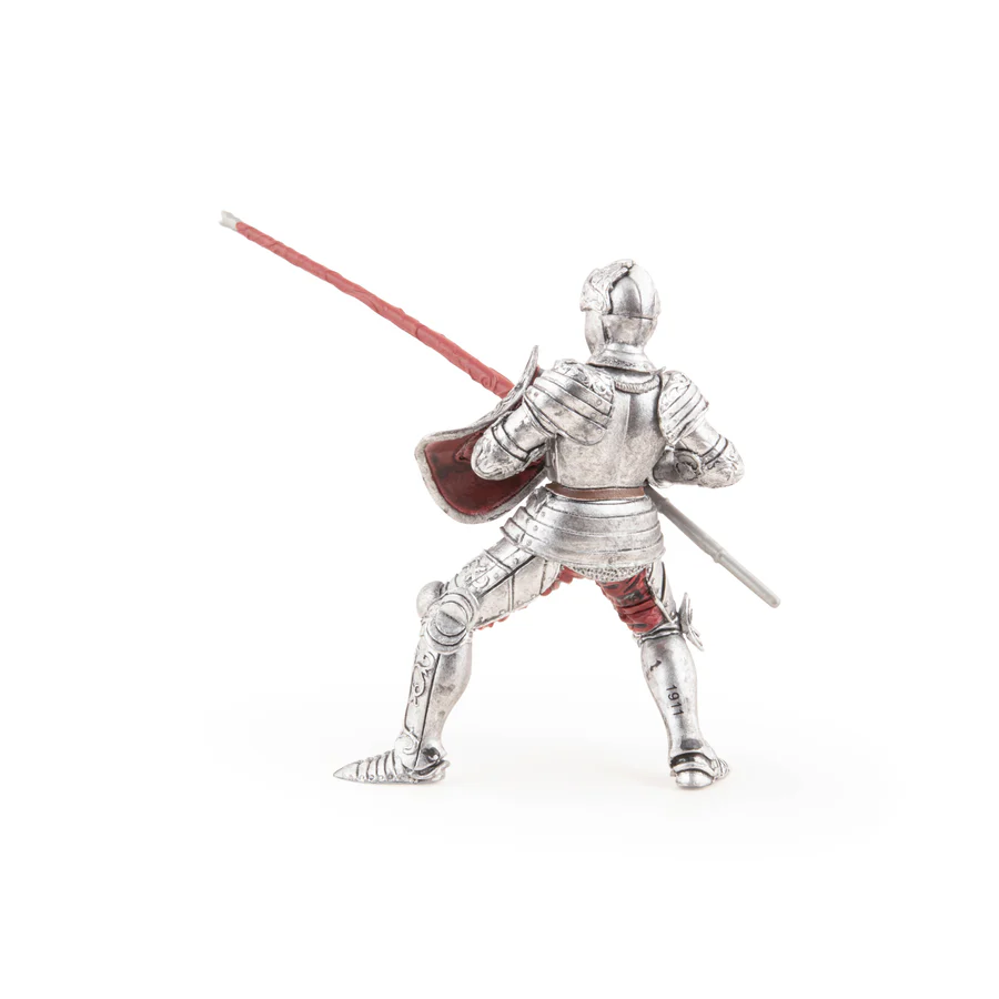 RYTÍŘ VE STŘÍBRNÉM BRNĚNÍ S DŘEVCEM